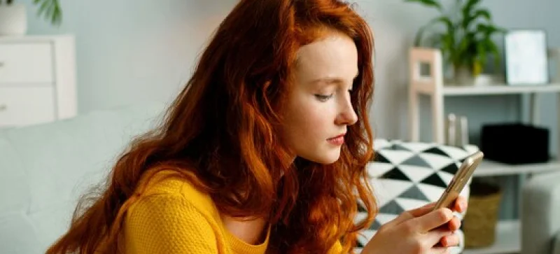 a girl using her phone